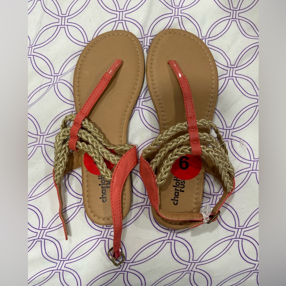 Coral sandals with gold.